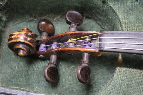 A 19th century violin, two piece back, cased with a later bow